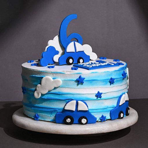 Delicious Birthday Cake Celebration with Blue Cars & Stars - Image 3