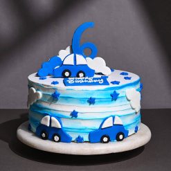 Delicious Birthday Cake Celebration with Blue Cars & Stars